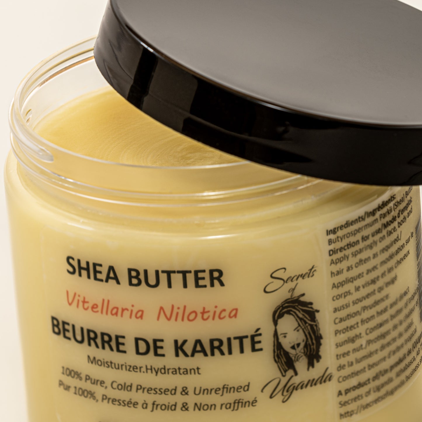 400ml Jar of Nilotica Shea Butter on a White Background Open Jar