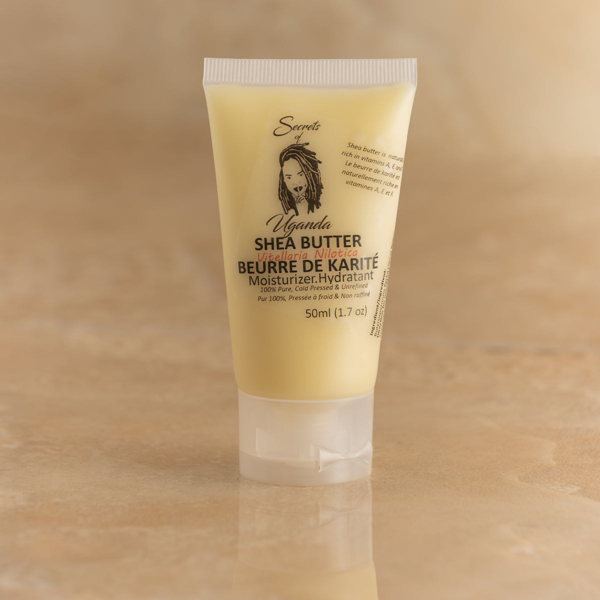 Open 50ml jar of Nilotica shea butter