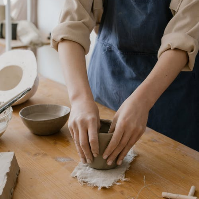 Hands looking soft and smooth near a sink